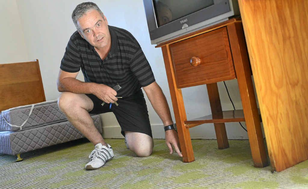 Cherrabah operations manager Dave George points to where the water came up to in a number of the rooms.
